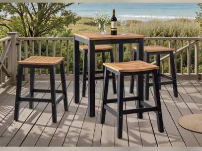 Square bar table and wooden stools with dark legs on a deck