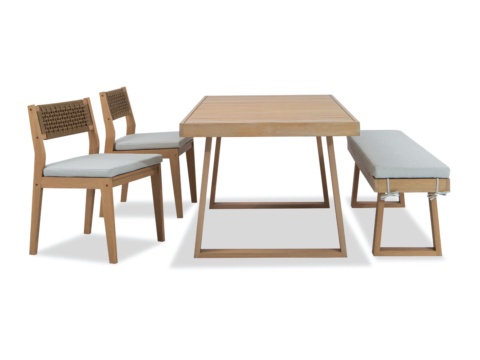 End view of a wooden dining table with two chairs and bench, white background