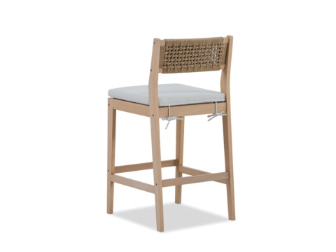 Bar chair with woven back, light grey cushion and light wood legs, white background