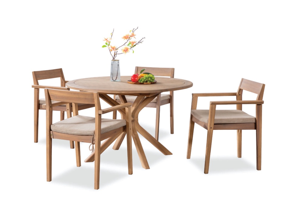 Round light wood dining set with four armchairs, flower vase and fruit, white background