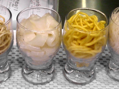 Six kinds of dried noodles in colours served in glass cups